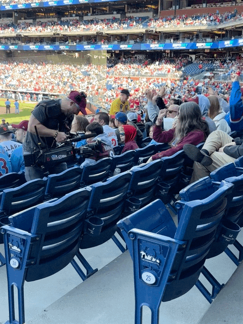 Camera guy and dancing fan