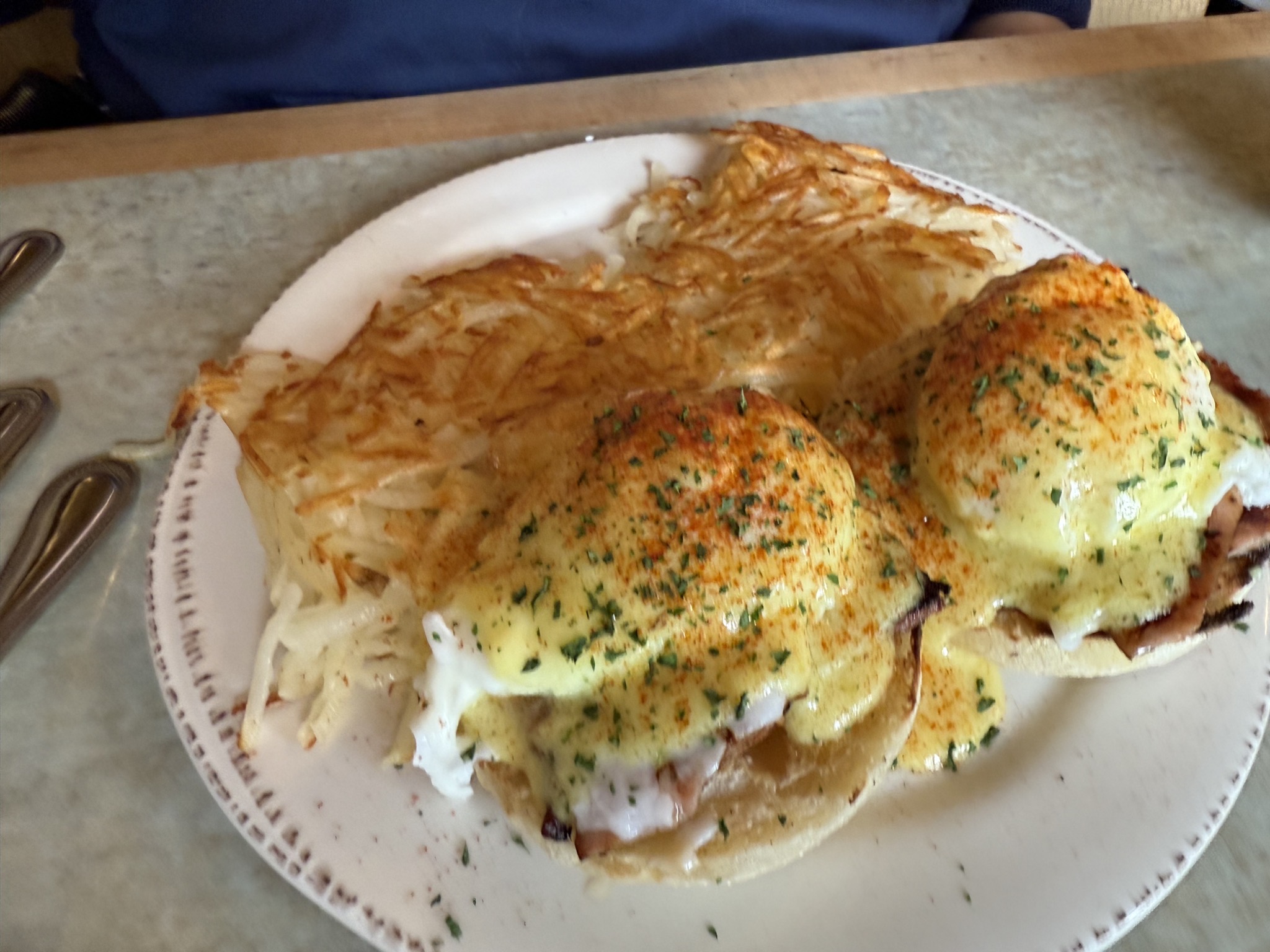 Eggs Benedict and hash browns