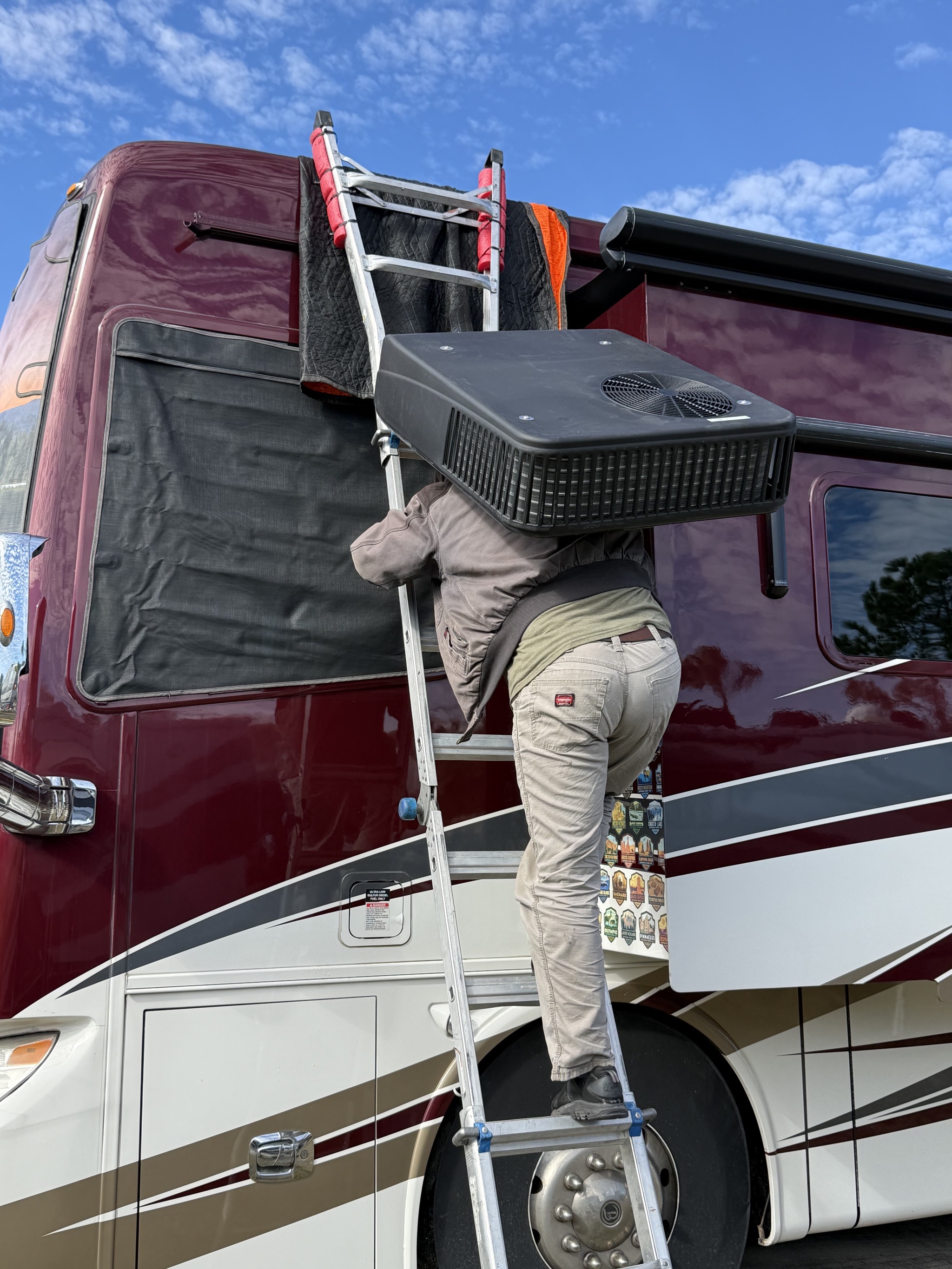 Carrying new AC up to roof