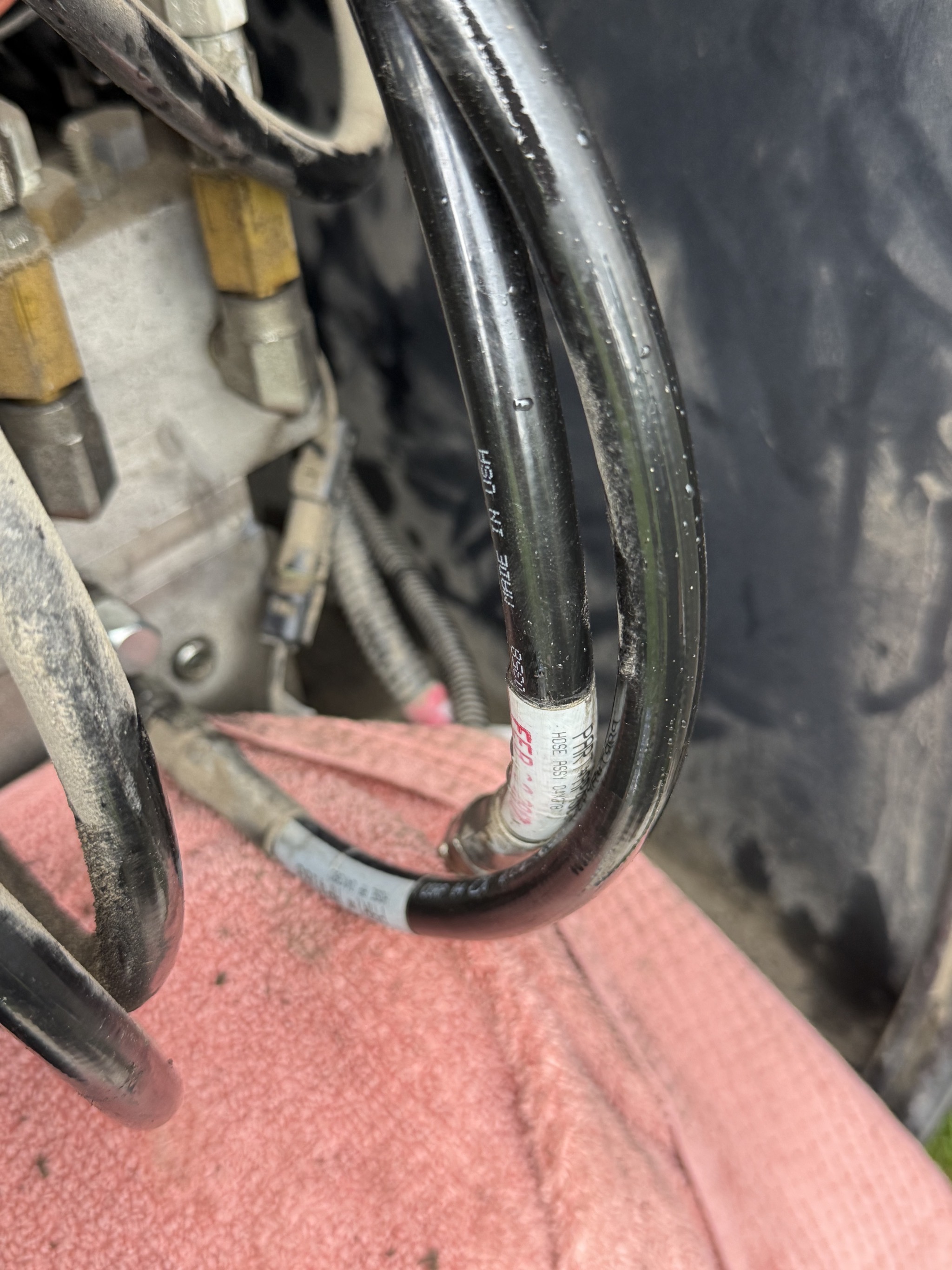 Capped hydraulic hoses