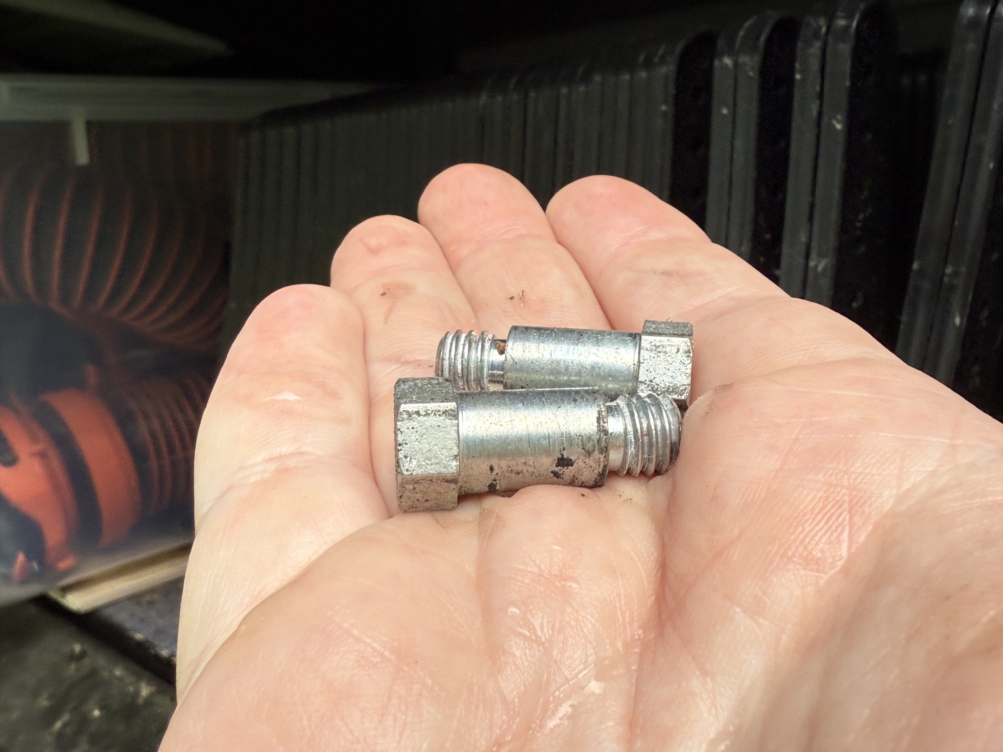Little bolts that hold slide to piston