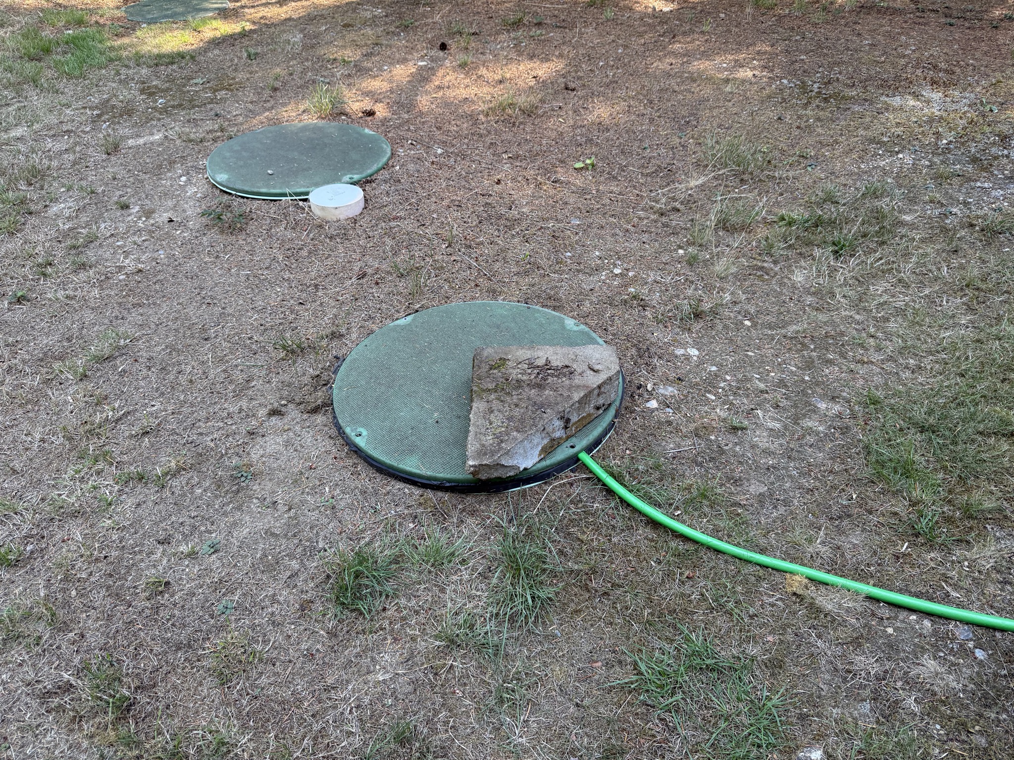 Hose into septic tank