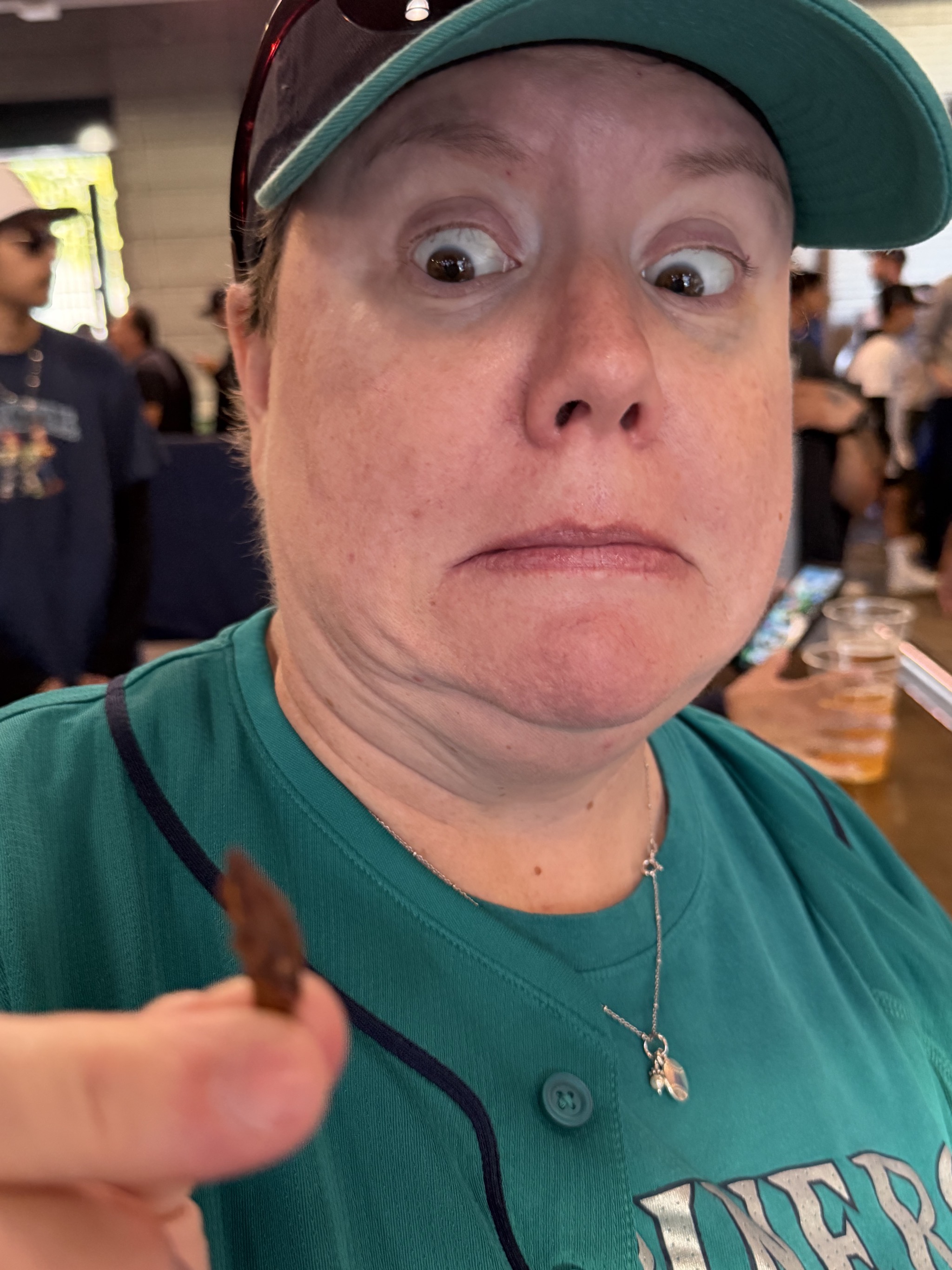 Jenn with a grasshopper (yes, we ate several; tastes kinda nutty)