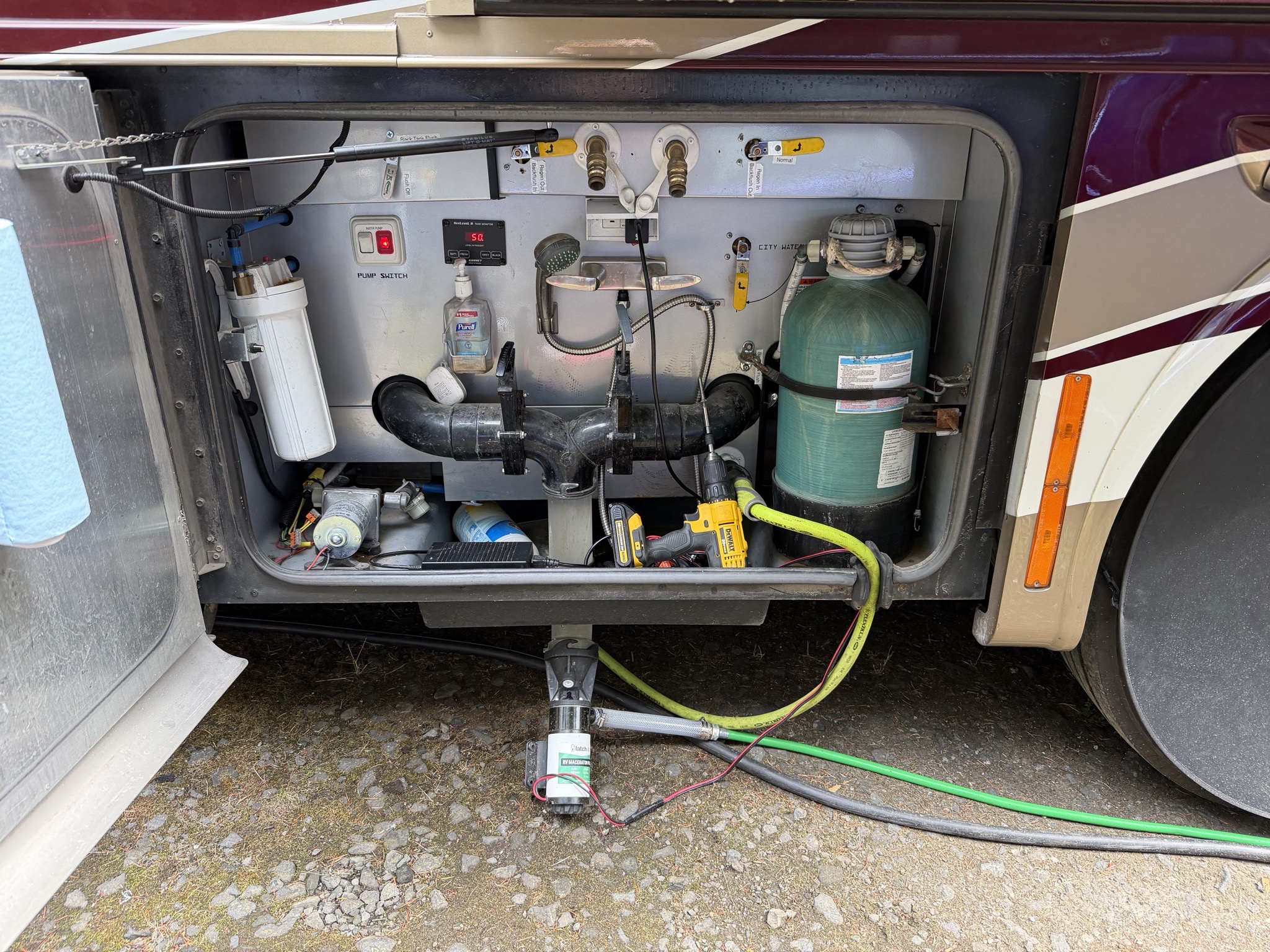 Using the macerator to dump our waste tanks