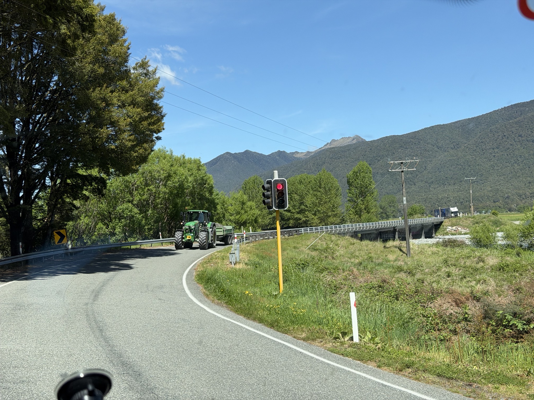 One way bridge with a traffic light